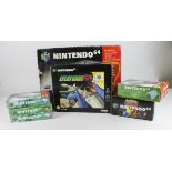 Nintendo 64. A group of five boxed N64 items comprising Nintendo 64 console (complete); Lylat