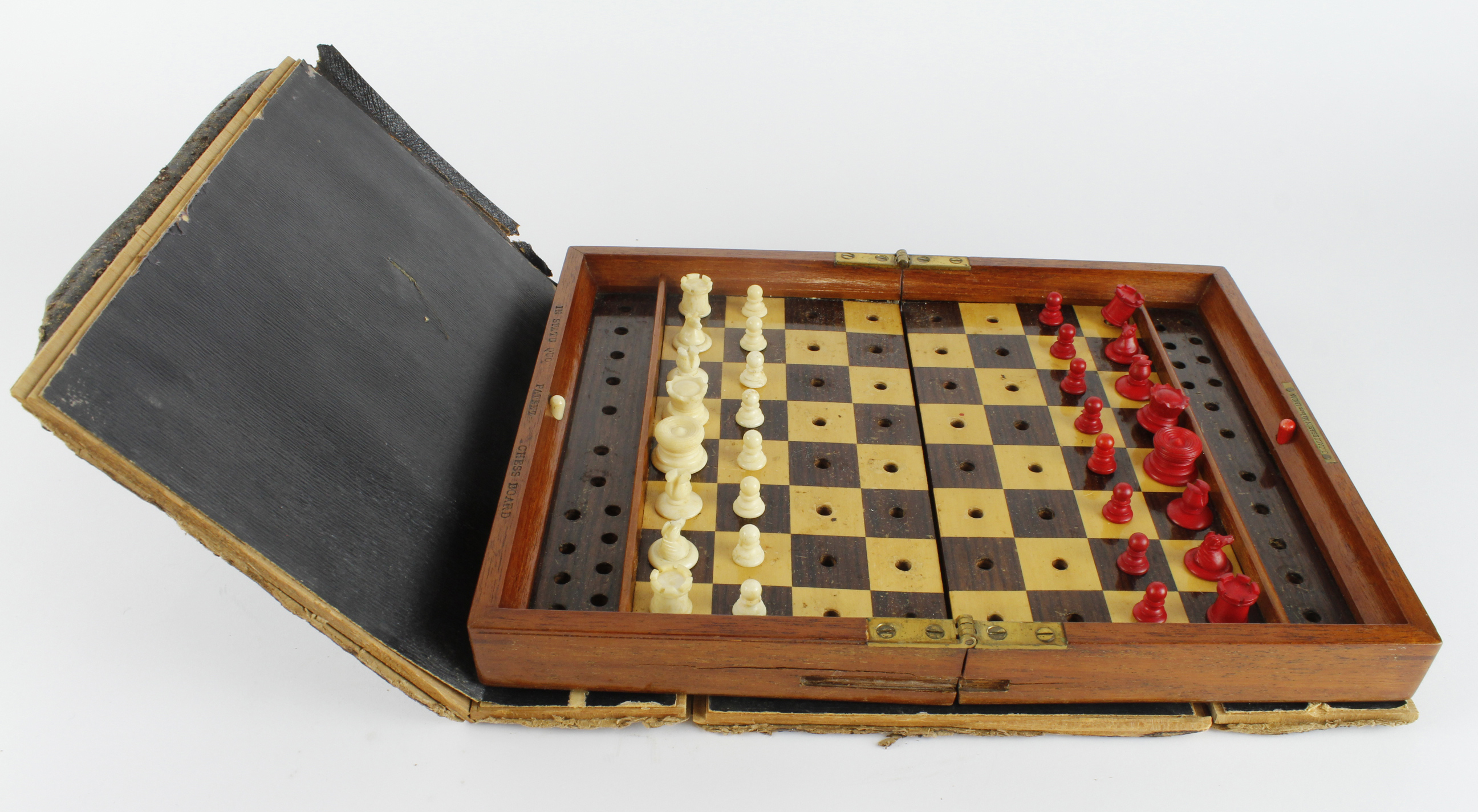 J. Jaques & Son mahogany cased folding travel chess set, stamped 'In Statu Quo, Patent, Chess