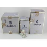 Lladro. A group of three boxed Lladro figures, comprising 'At the Ball', 'Pierrot with Puppy' & '