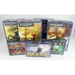 Warhammer 40k. A collection of seven boxed Warhammer 40k sets, including Ork Battlewagon, Space