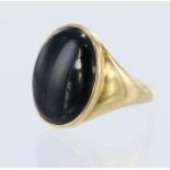 Yellow metal (tests 18ct) onyx signet ring, onyx table size 19mm x 15mm, finger size T, weight 8g.