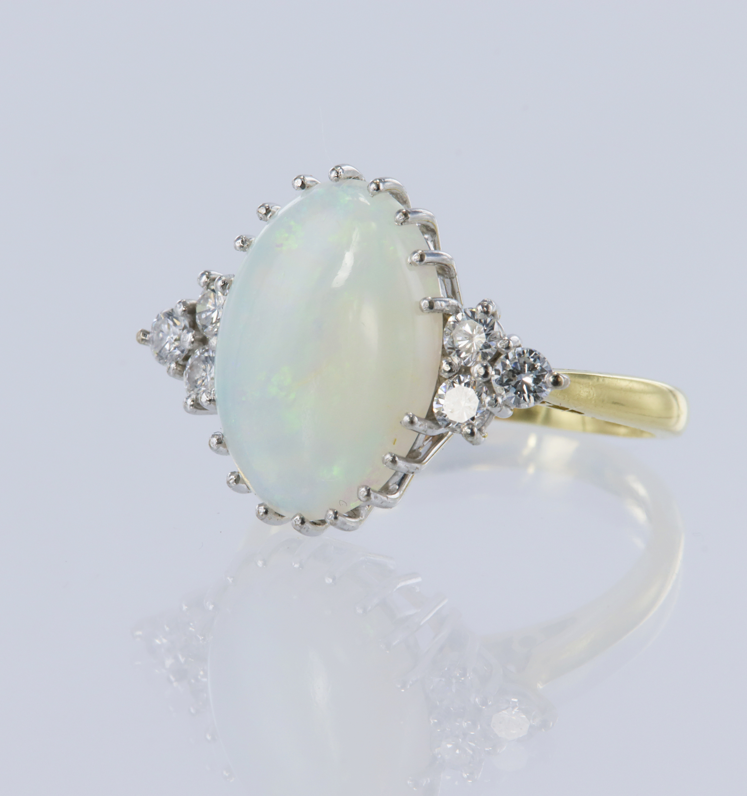 18ct yellow gold opal and diamond dress ring, oval cabochon cut opal measures 13.5mm x 9.8mm,
