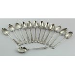 Mixed lot of silver spoons comprising six shell-bowled teaspoons hallmarked London 1902 and one