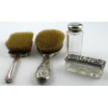Mixed lot of two silver mounted hair brushes and two silver and glass toilet items comprising a