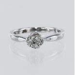 18ct white gold diamond cluster ring, principle round brilliant cut diamond weight approx 0.20ct,