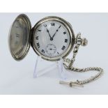 Sterling silver cased full hunter pocket watch by Dennison Watch Case & Co Ltd, white enamel dial