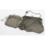 Two silver mesh evening bags,the larger one is hallmarked London, 1916 and the smaller one is
