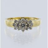 18ct yellow gold diamond cluster ring, principle round briliant cut diamond 0.15ct, surrounded eight