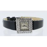 Ladies white gold (tests 18ct) cased Longines manual wind wristwatch, square cream dial with batons,
