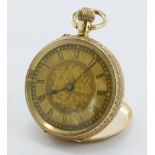 Ladies 18k open face pocket watch. The gilt dial with foliate engraved decoration and black roman