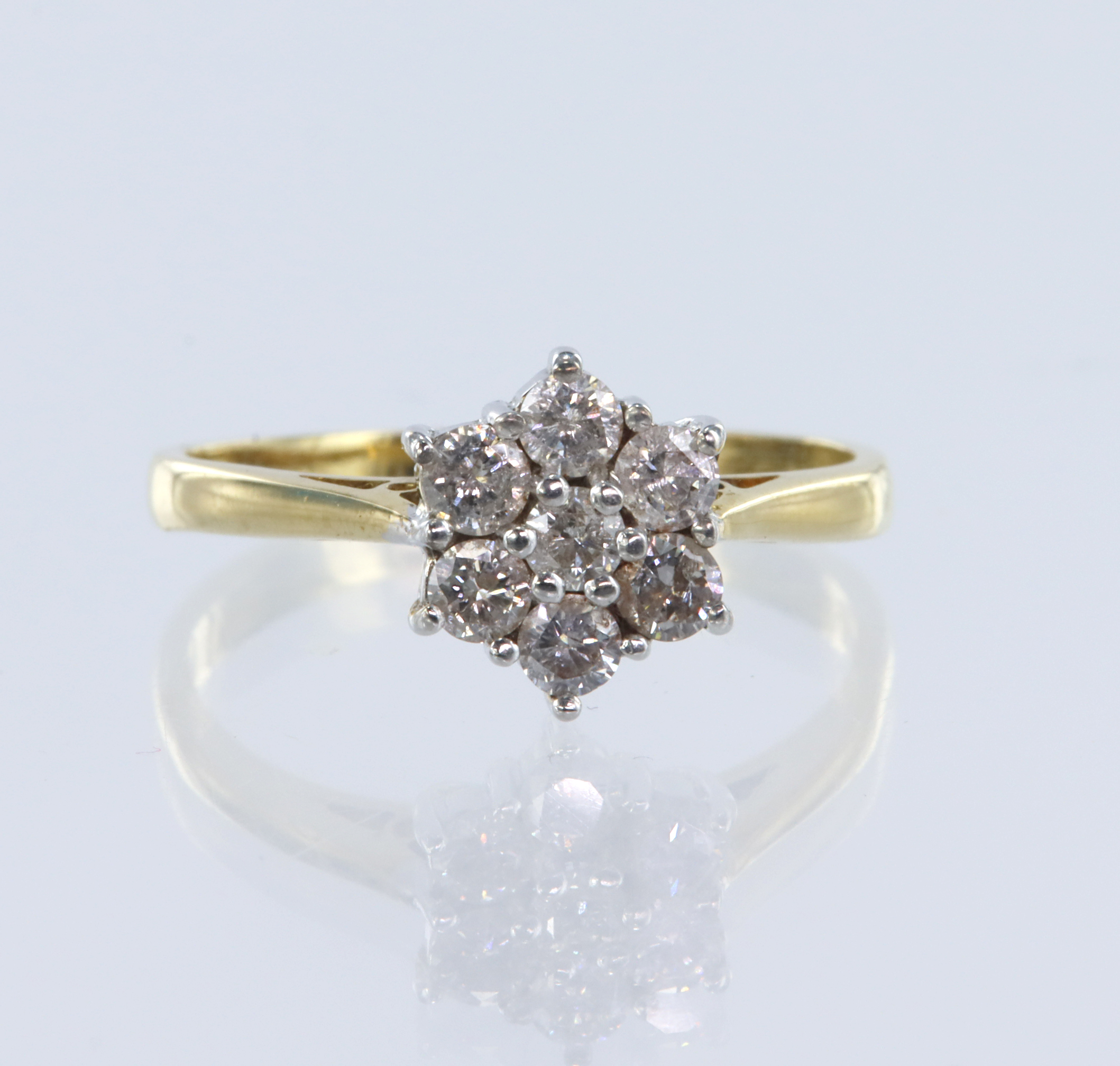 18ct yellow gold diamond ring, set with seven round brilliant cut diamonds, total weight approx 0.