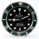 Advertising Wall Clock. Black & Green 'Rolex' style advertising wall clock, black dial reads '