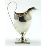 George III helmet shaped silver cream jug for Nathaniel Smith & Co., Sheffield, 1822 (marks are