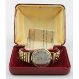 Gents 9ct cased Swiss Emperor De Luxe wristwatch. The cream dial with gilt baton markers, Date