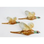 Beswick. Three Beswick pheasant wall plaques, comprising 661-1, 661-2 & 661-3