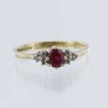 9ct yellow gold ruby and diamond ring, one oval mix cut ruby measuring 5mm x 4mm, diamond set