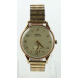Gents 9ct cased Trebex wristwatch. The cream dial with gilt arabic numerals and subsidiary second