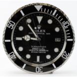 Advertising Wall Clock. Black 'Rolex' style advertising wall clock, black dial reads 'Rolex Oyster