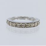 9ct white gold eternity ring, set with thirteen round brilliant cut diamonds total weight approx 1.