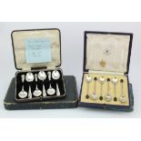 Four boxed sets of silver cutlery comprising two sets of six bean topped coffee spoons, + a set of