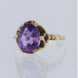 9ct yellow gold amethyst solitaire ring, oval mix cut amethyst measures 10mm x 8mm, set in six