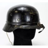 Civil Defence helmet - Ribbed shell - black finish. Temple stamp NS66.