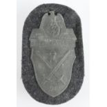 Demjansk Arm Shield 1942 with blue cloth backing