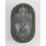 Demjansk Arm Shield 1942 with green cloth backing