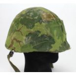 American Vietnam era fixed bale M1 helmet.