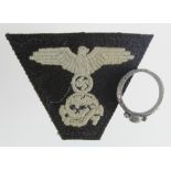 German Nazi SS cloth insignia and deaths head ring.