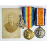 BWM & Victory Medal + Cap badge and small photo. 41809 Pte F Dent York R. Wounded GSW left leg,