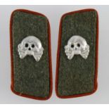 German pair of Panzer collar tabs with red piping.