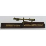 Coin Scales: H. Bell and Co. wooden cased folding brass balance for Guineas and Sovereigns.