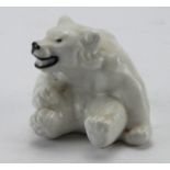 Royal Copenhagen porcelain figure, depicting a small seated polar bear (no. 248), makers marks to