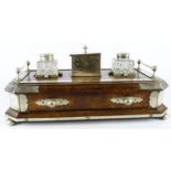 Large oak desk stand with silver plated mounts, with two inkwells and lidded box to centre, raised