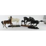 Four horse figures, makers include Royal Doulton & Franklin Mint, tallest 22cm approx.