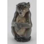 Royal Copenhagen porcelain figure, depicting a seated monkey, (no. 1444), makers marks to base,