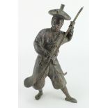 Bronze (?) Chinese warrior / soldier, Chinese characters to coat, length 35cm approx.