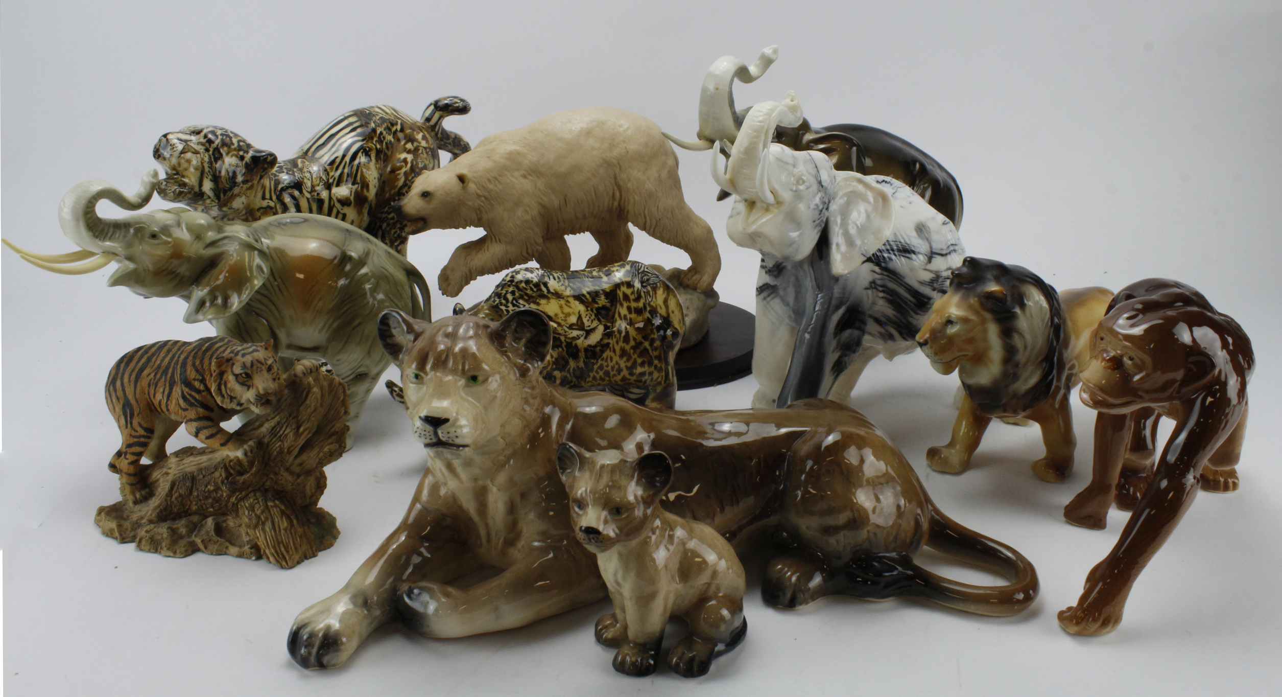 Animal interest. A group of eleven various animal figures (mainly porcelain & resin), including