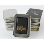 Zippo. A group of seven cased Beatles themed Zippo lighters