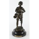 Bronze boy figure on a base. Chanteur Des Rues par L F Moreau. Signed & stamp AE 167. Height 40cm