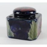 Moorcroft 'Pansy' pattern inkwell with lid, floral decoration, makers marks to base, height 65mm