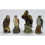 Four porcelain figures, depicting birds of prey, comprising three whiskey bottles by Beswick & a