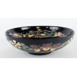 Moorcroft. Large Moorcroft 'Oberon' pattern bowl with floral decoration, with makers mark and signed