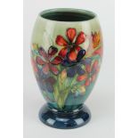 Moorcroft vase with floral decoration, with impressed makers mark and signed to base, height 17cm