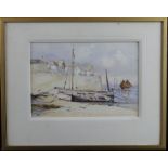 Simmons, Eyres (British 1872-1955) Watercolour depicitin fishing boats on the shore by a seaside