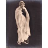Photographs, 2 original photographs from the studio of Elwin Neame picturing a glamorous girl in a