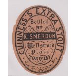Beer label, Guinness's Extra Stout, bottled by R Smerdon, Torquay, a rare c1896 vertical oval, 88 mm
