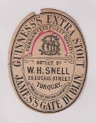 Beer label, Guinness's Extra Stout, bottled by W H Snell, Torquay, a rare c1896 vertical oval (