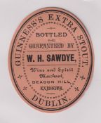 Beer label, Guinness's Extra Stout, a rare c1896 vertical oval bottled by W H Sawdye, Beacon Hill,